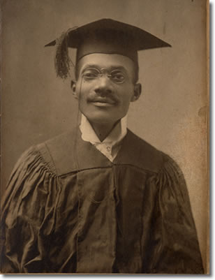 Meharry graduate in cap and gown, 1900s